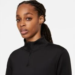 Nike Women's Therma-Fit One Long-Sleeve 1/2 Zip Top (Plus Sizes) - Black (DN2239-010) 10 Nike Women's Therma-Fit One Long-Sleeve 1/2 Zip Top (Plus Sizes) - Black (DN2239-010) -Sports Cheap Shop DN2239 010 PHSYM001 JPG HEI 875 WID 875